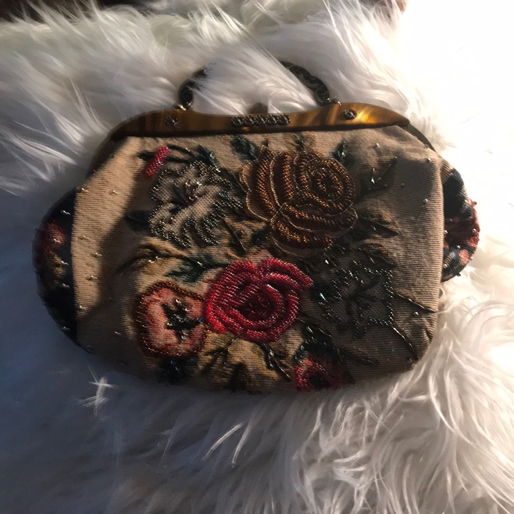 Beaded adorned bag.